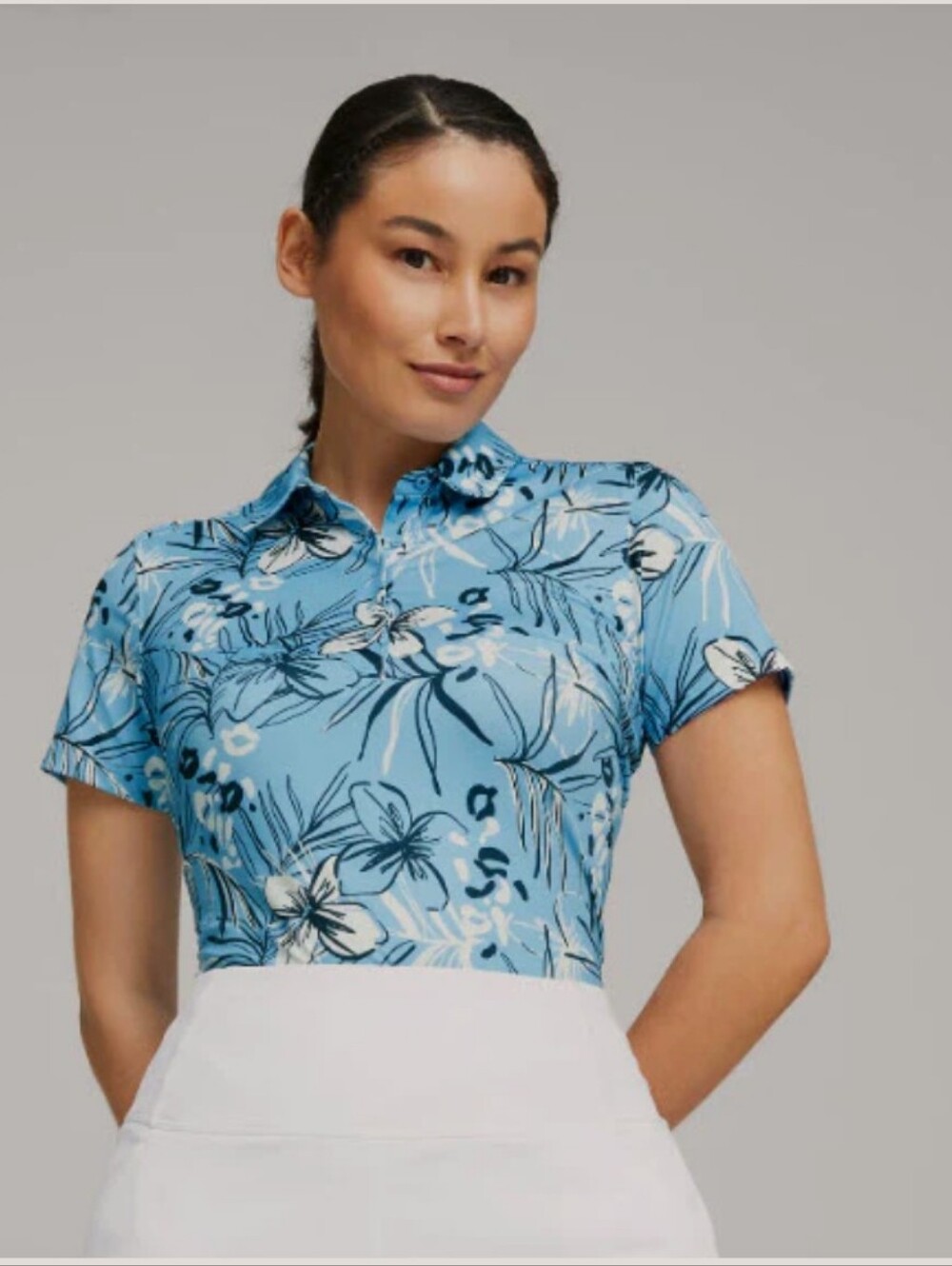 Puma women's MATTR Artwork Polo Floral Blouse. Size Large. NWT